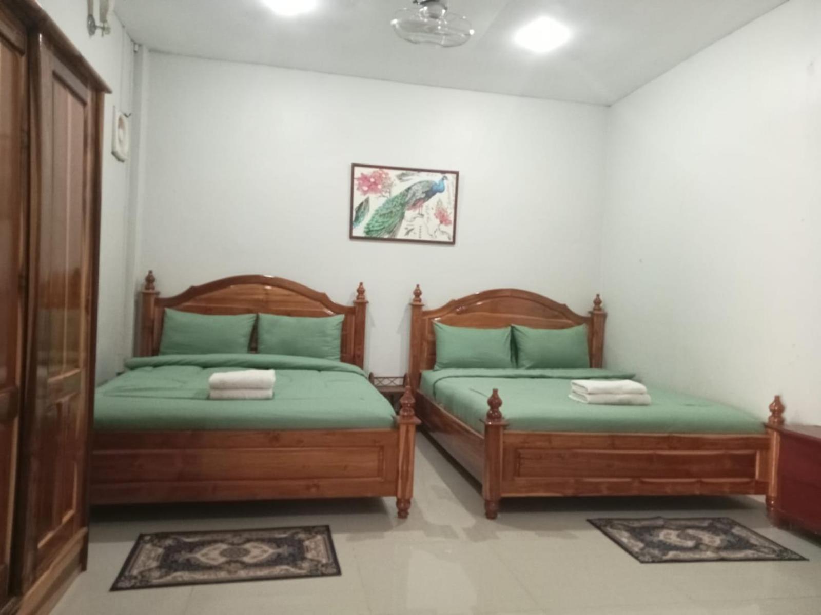 Erawan Guesthouse Паксе Екстериор снимка